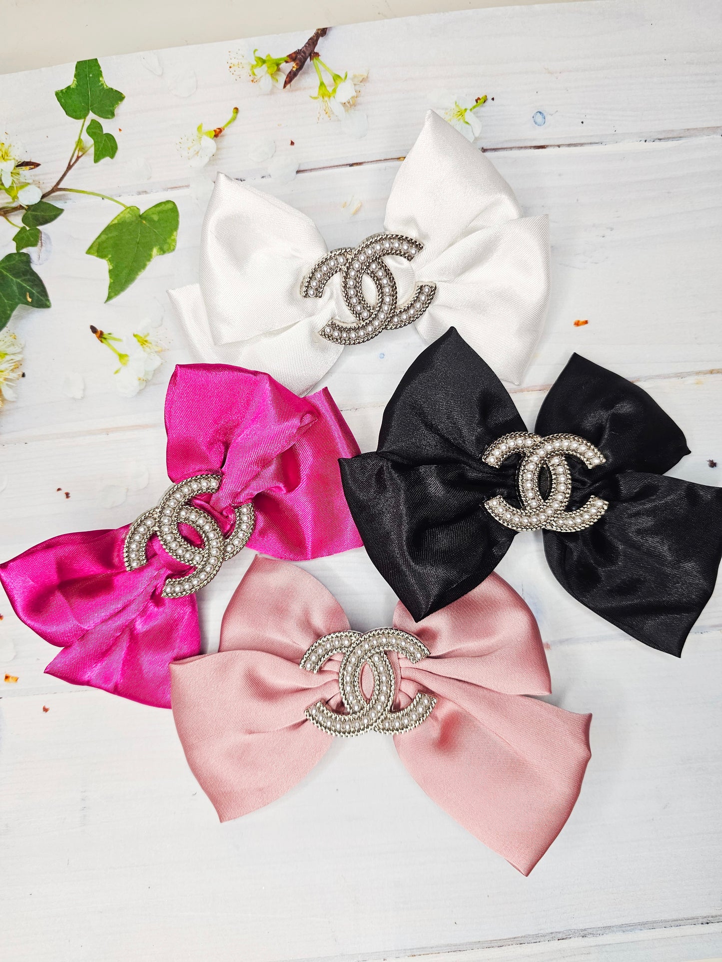 Large chanel croc bows, come in pairs!