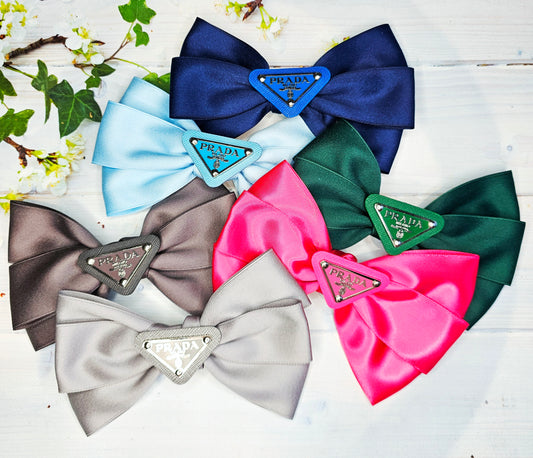 NEW COLOURS, prada croc bows. They come in pairs!